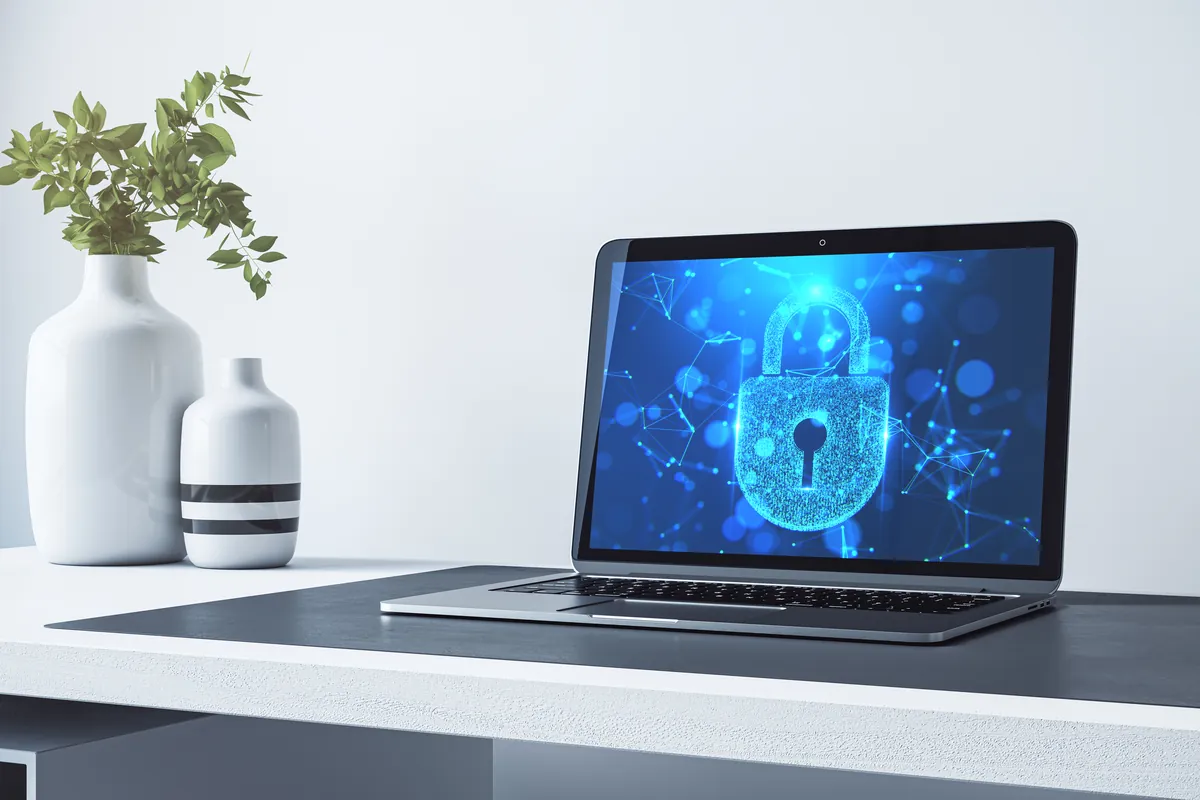 An image showing a computer screen with a lock symbol representing data security and backup