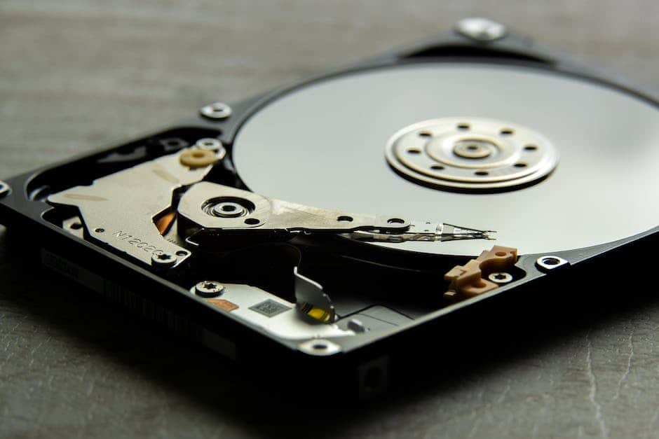 Image depicting a person holding a backup drive, symbolizing the importance of data backup and protection.